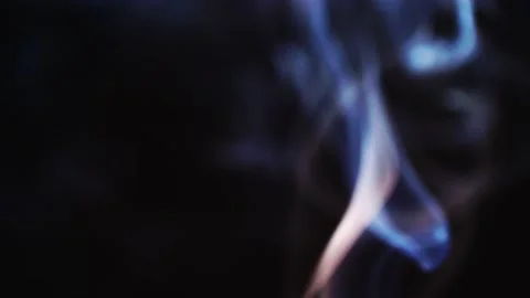 Realistic cloud smoke with a streamlined pattern. Abstract red smoke on Stock Footage 181532476