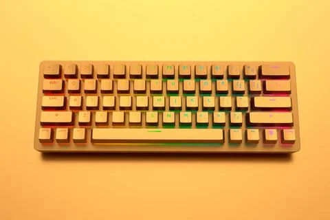 Realistic computer keyboard with golden chrome texture isolated on gold Stock Illustration