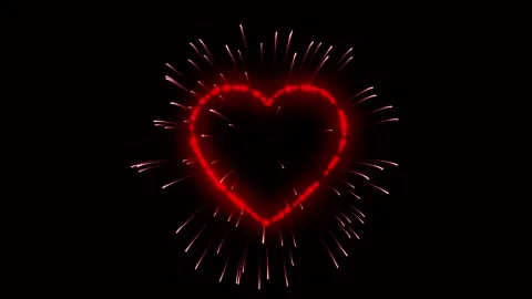 Realistic firework heart shape on black background, Stock Footage