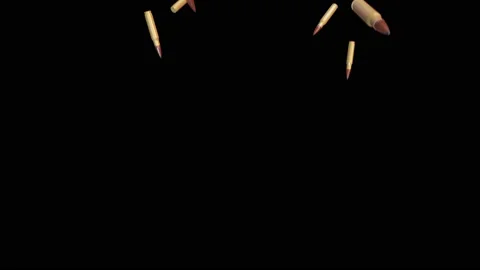 Realistic flying and rotating bullets isolated on black background. Stock Footage 120064095