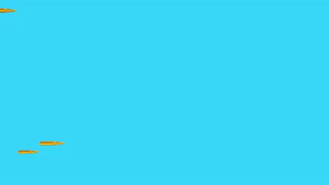Realistic flying forward golden bullets isolated on blue background. Stock Footage 120064033