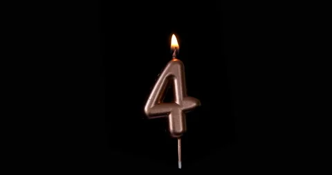 Realistic full-sized single birthday candlelight 4 four number isolated on black Video stock 142745825