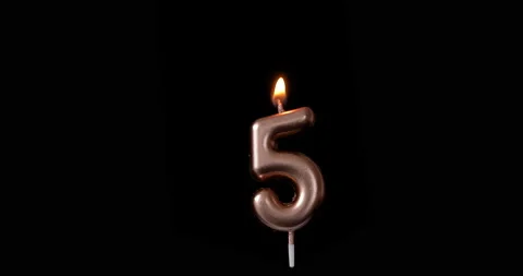 Realistic full-sized single birthday candlelight 5 five number isolated on black Video stock 142746136