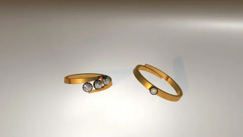 Realistic graphic animation of gold ring patterns with falling - 4K - ProRes Stock Footage 154248623