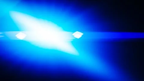 Realistic Len flare glow light effect on black background. Optical flares ove Stock Illustration