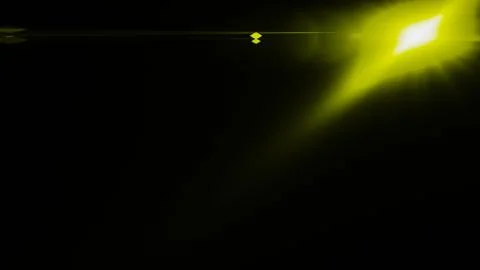 Realistic Len flare glow light effect on black background. Optical flares ove Stock Illustration