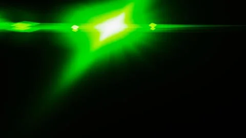 Realistic Len flare glow light effect on black background. Optical flares ove Stock Illustration