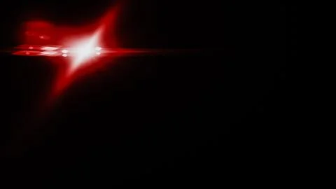 Realistic Len flare glow light effect on black background. Optical flares ove Stock Illustration