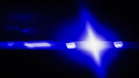 Realistic Len flare glow light effect on black background. Optical flares ove Stock Illustration