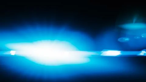 Realistic Len flare glow light effect on black background. Optical flares ove Stock Illustration