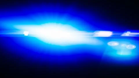 Realistic Len flare glow light effect on black background. Optical flares ove Stock Illustration