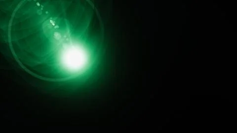 Realistic Len flare glow light effect on black background. Optical flares ove Stock Illustration