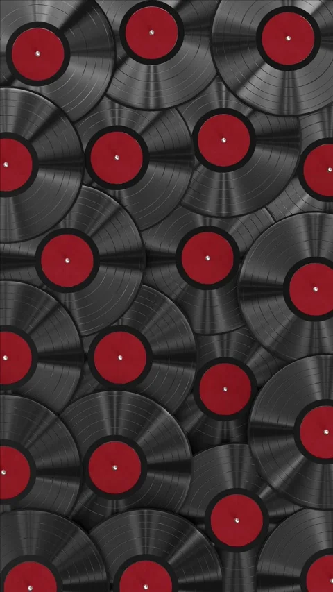 Realistic looping 3D animation of the black vinyl records with red labels Video stock 274080391