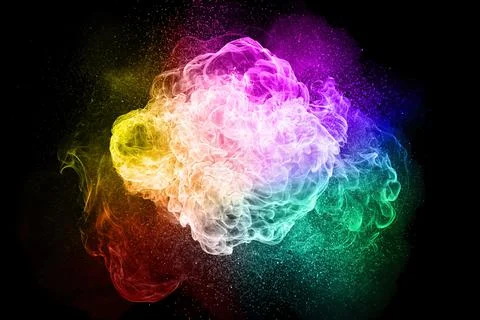 Realistic multi colored flames explosion isolated on black background Stock Photos