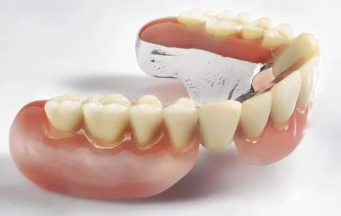 Realistic Removable Partial Denture with Metal Framework on White Background Stock Photos