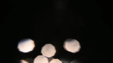 Realistic shooting of light reflections on the lens. Foreground bokeh for Vídeo Stock 303641948