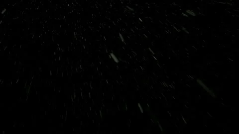Realistic Snow Falling on a Dark Background. Blurry Snow Stock Footage 346741595