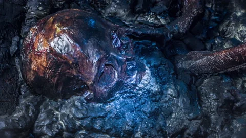 Realistic special effects makeup burn bones and skull rotate close-up props. Stock Footage 127805144