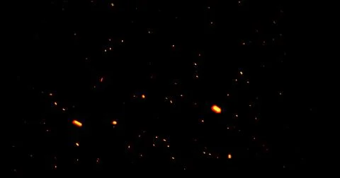 Realistic surreal ember fire dust slowing rising up on black bg. Grunge dar.. Stock Illustration