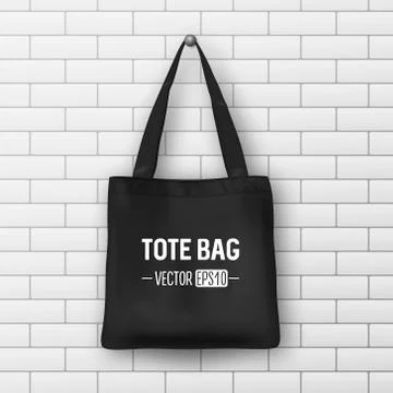 Realistic vector black textile tote bag. Closeup on brick wall background Illustrazione stock