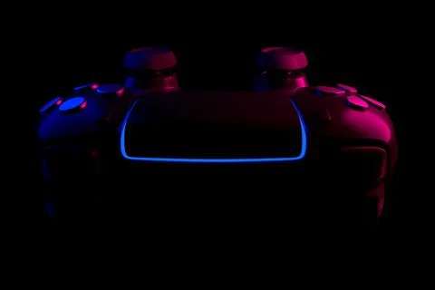Realistic video game controller in neon lights on black noir background Stock Illustration
