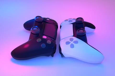 Realistic video game controllers in neon lights on white table background Stock Illustration