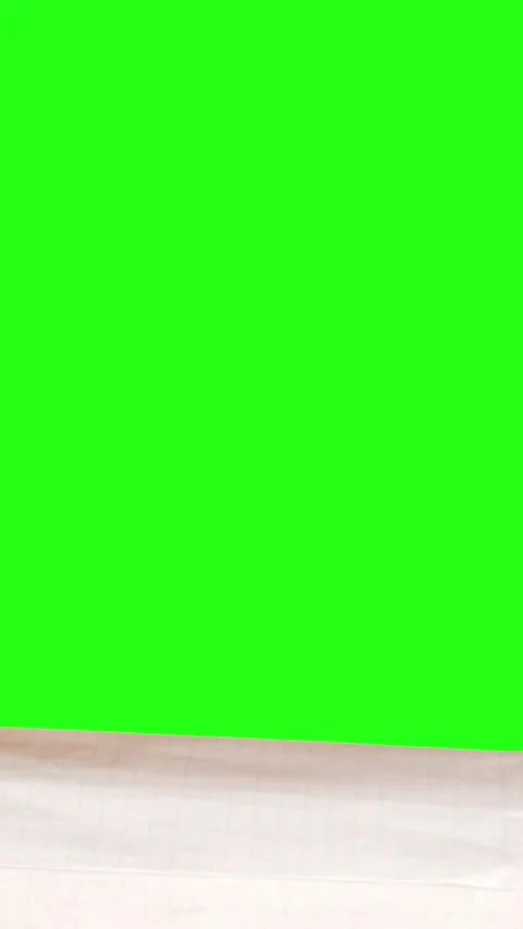 Realistic white paper rolling vertical transition sheet roll reveal green screen Video stock 299954556