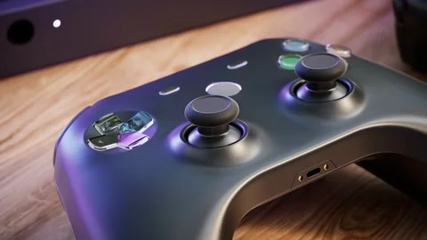 Realistic wireless gamepad for playing games. Video game controller on the table Vidéo 201219079