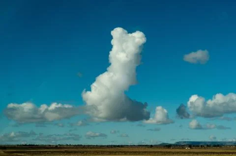 A really big cloud in the middle of nowhere Stockfoto's