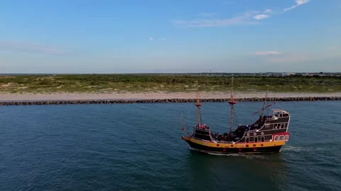 A really cool drone video of a pirate ship in the Saint Augustine Inlet in Stock Footage 276726261