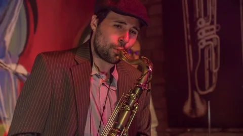 Really enjoying playing a saxophone Stock Footage 112199422