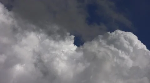 Realtime big white cumulus cloud in blue sky Stock Footage 47624451