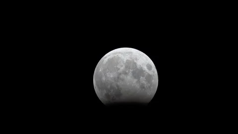Realtime partial lunar eclipse 28 october 2023 Stock Footage 255131496