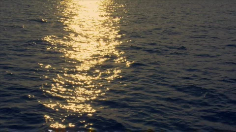 Realtime sundown reflection wide ocean Stock Footage 144835