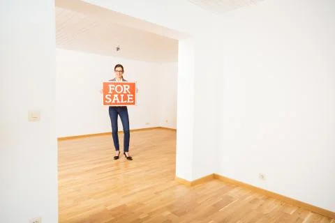 Realtor In Empty Apartment 写真素材