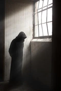 Reaper waiting in a dark abandoned building Stock Photos