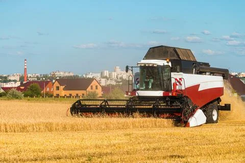 Reaping machine in the suburb Stock Photos