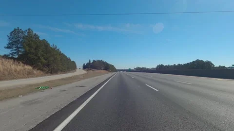 Rear camera view in reverse effect on the interstate Bobby Jones at the inter Stock Footage 150186049