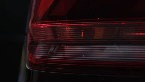 Rear car taillight with blinking amber turn signal, close up automotive 스톡 동영상 337420512