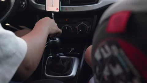 Rear close up view of man's hand is shifting manual transmission Stock Footage 204851083