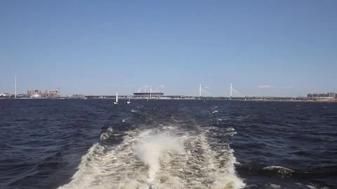 Rear Deck View Of fast Cruising Ship. Sailing away on a catamaran from St. Peter Stock Footage 312328537