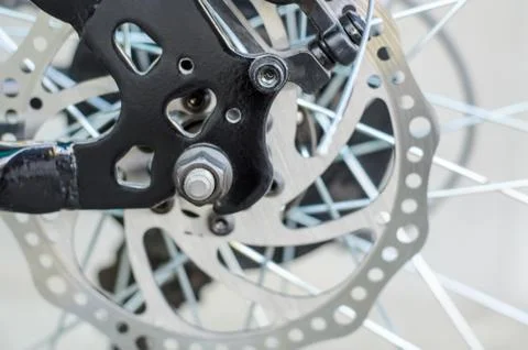 Rear disc brake system close-up on a bicycle. Stock Photos