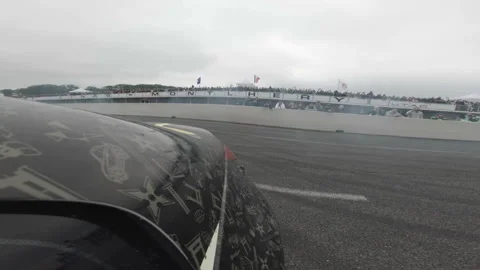 Rear door action camera shows cars doing donuts Stock Footage 345259347
