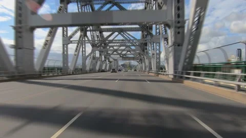 Rear facing driving point of view POV on large modern girder bridge with Stockbeeldmateriaal 146625962