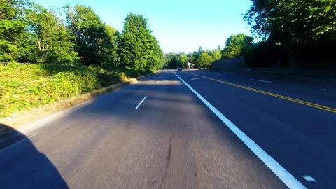 Rear Facing Motion Lapse of a Two Lane Suburban Road(Color Graded) Stock Footage 246676189
