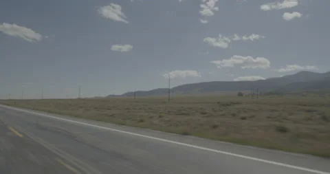 Rear left driving plate - Highway 285 at Mile 113 Saguache County Vídeo Stock 288897967