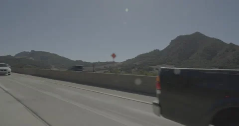 Rear left driving plate - Highway 1 at Kansas Avenue, San Luis Obispo Stock Footage 294792000