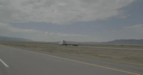 Rear left driving plate - I-15 at Mile 85 Parowan Stock Footage 288453040