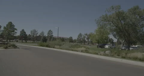 Rear left driving plate - Lions Park Drive at Carey Avenue Cheyenne Vídeo Stock 289679461
