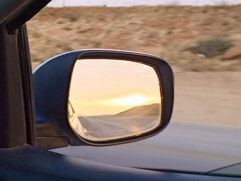 Rear Mirror Reflection of a Real Sunset Stock Photos